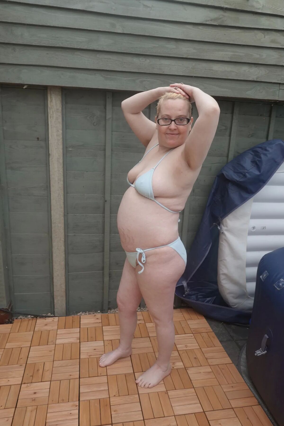 Big breasts wife in bikini