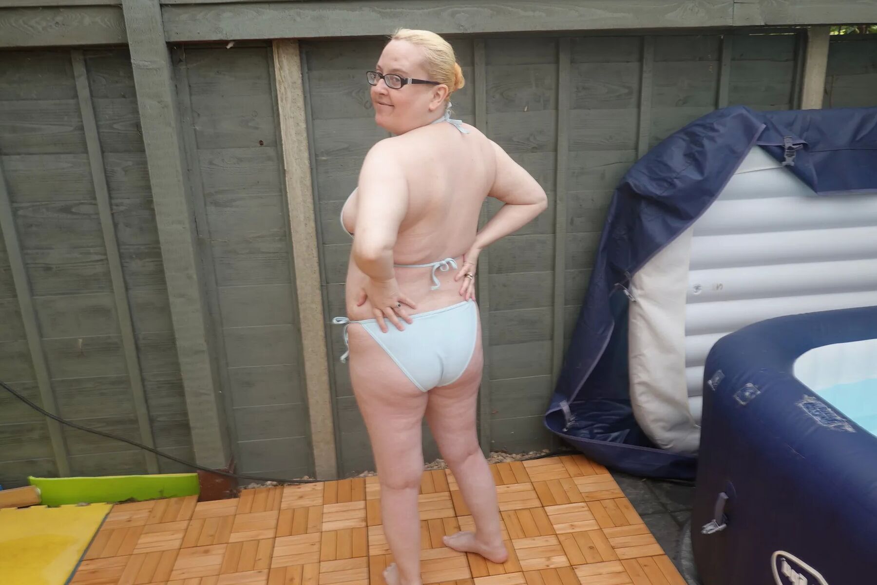 Big breasts wife in bikini