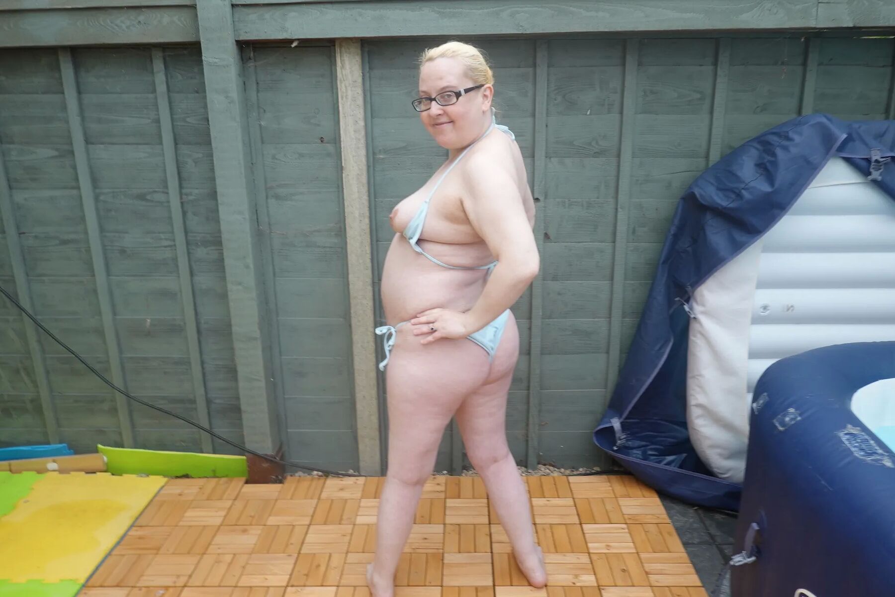 Big breasts wife in bikini