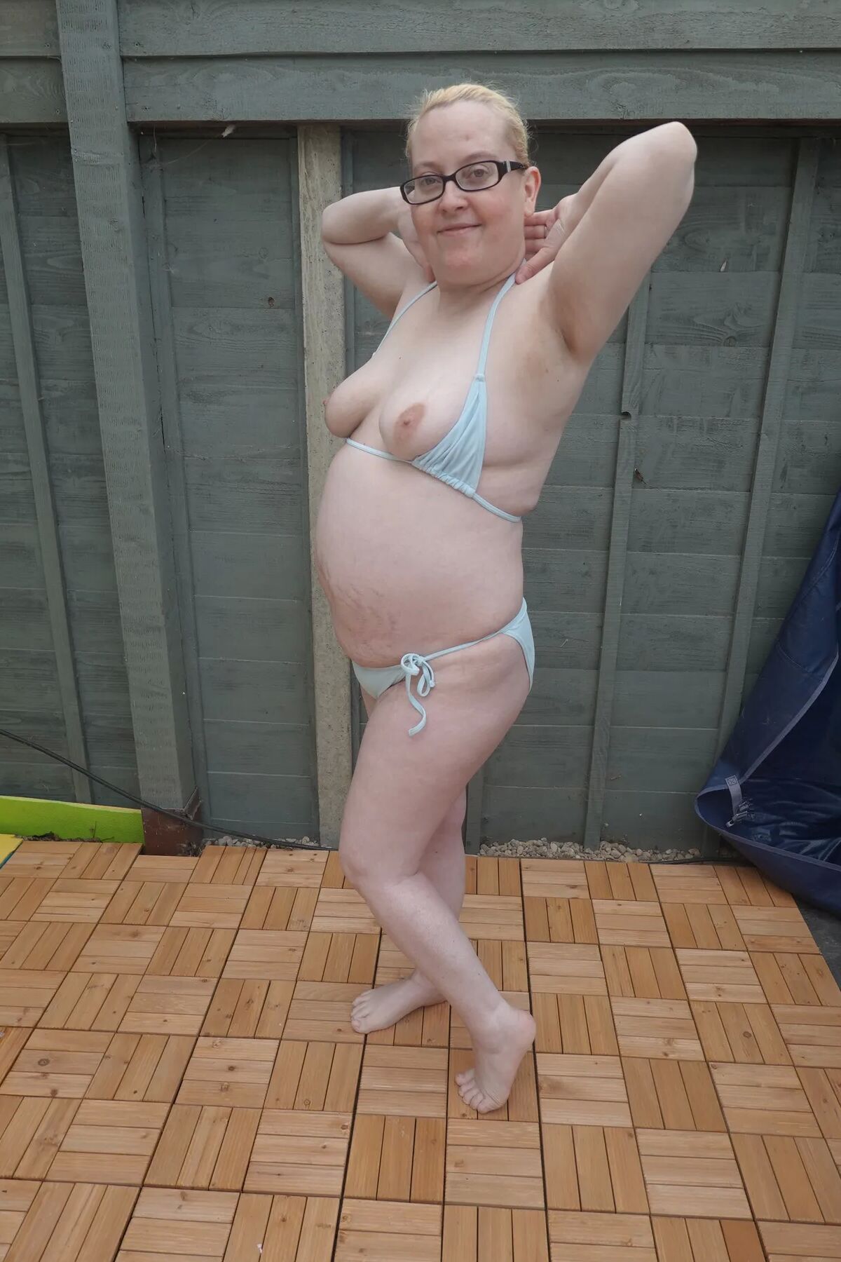 Big breasts wife in bikini