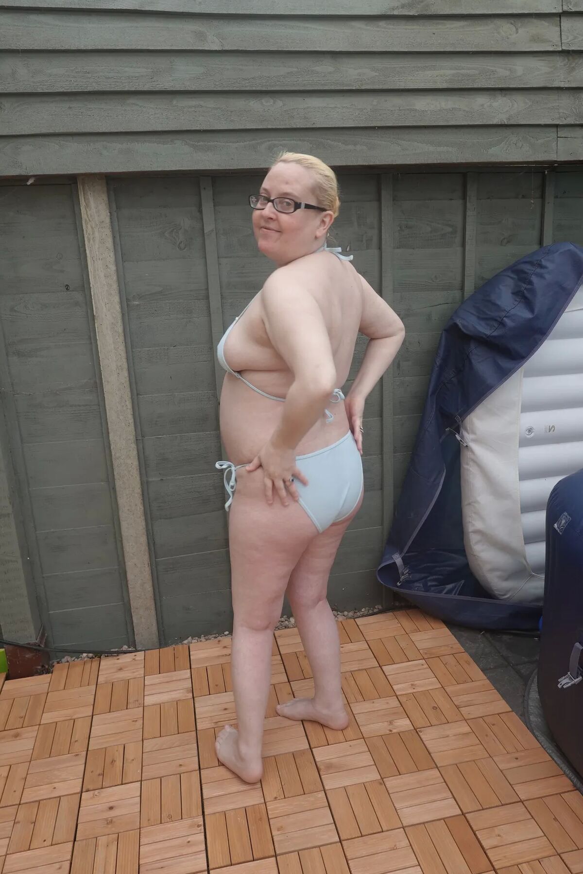 Big breasts wife in bikini