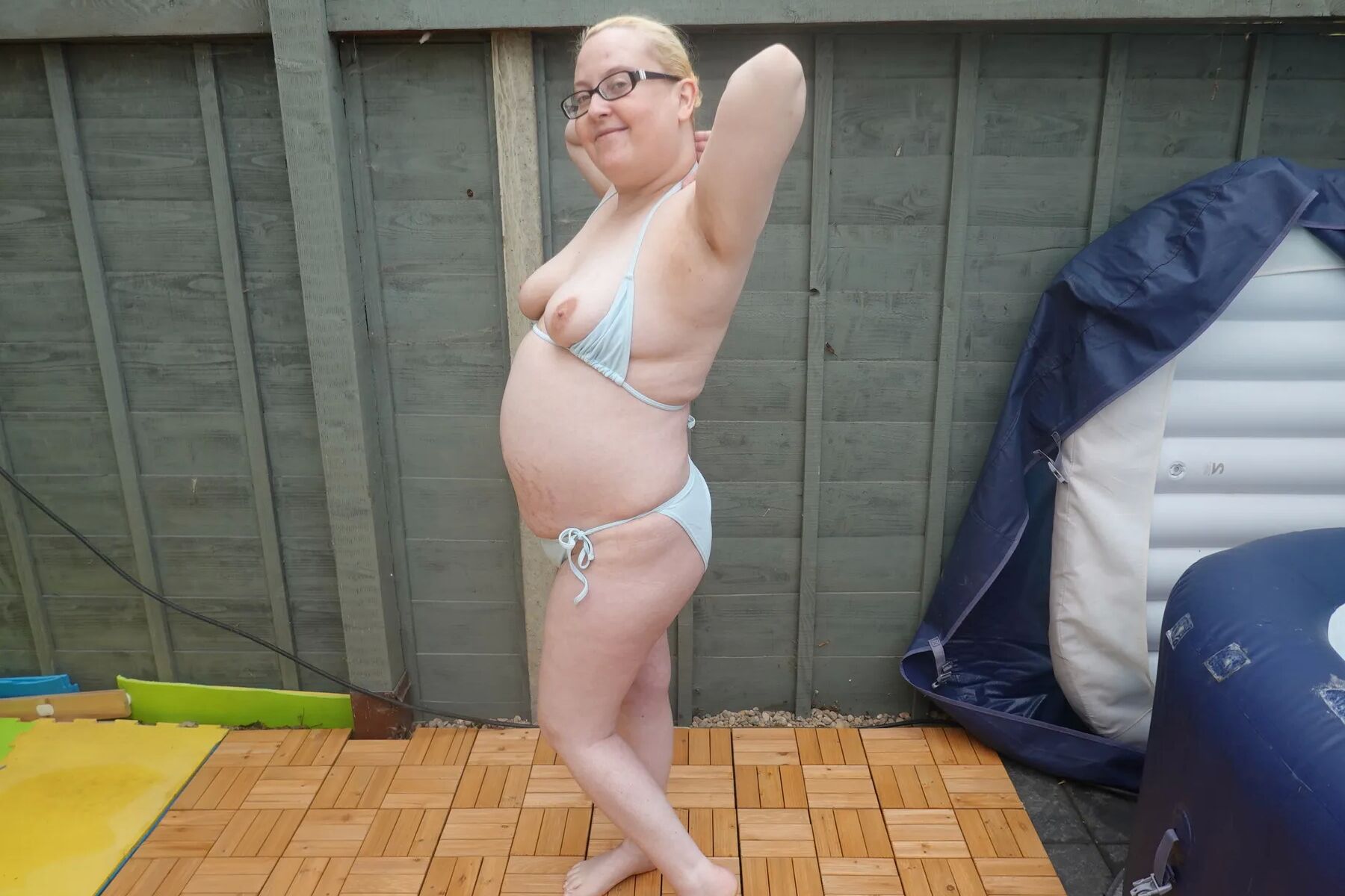 Big breasts wife in bikini