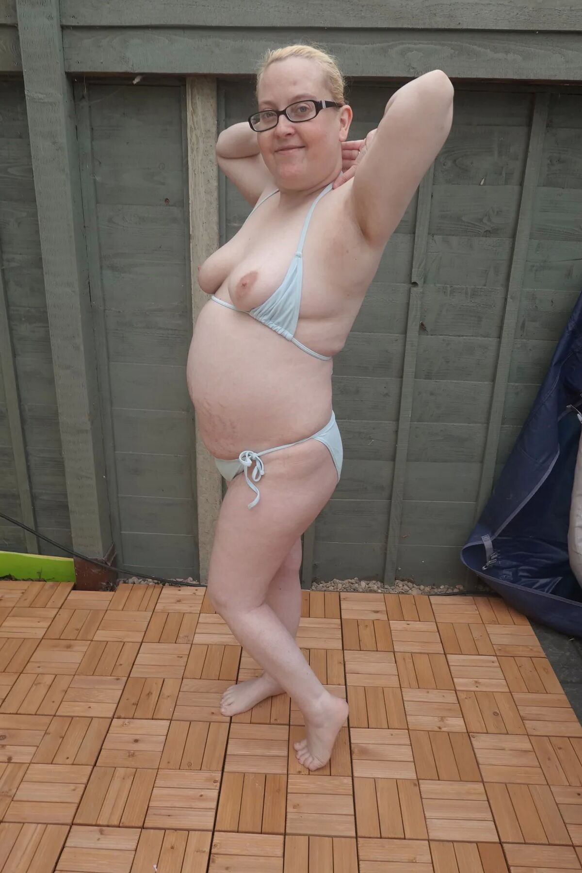 Big breasts wife in bikini