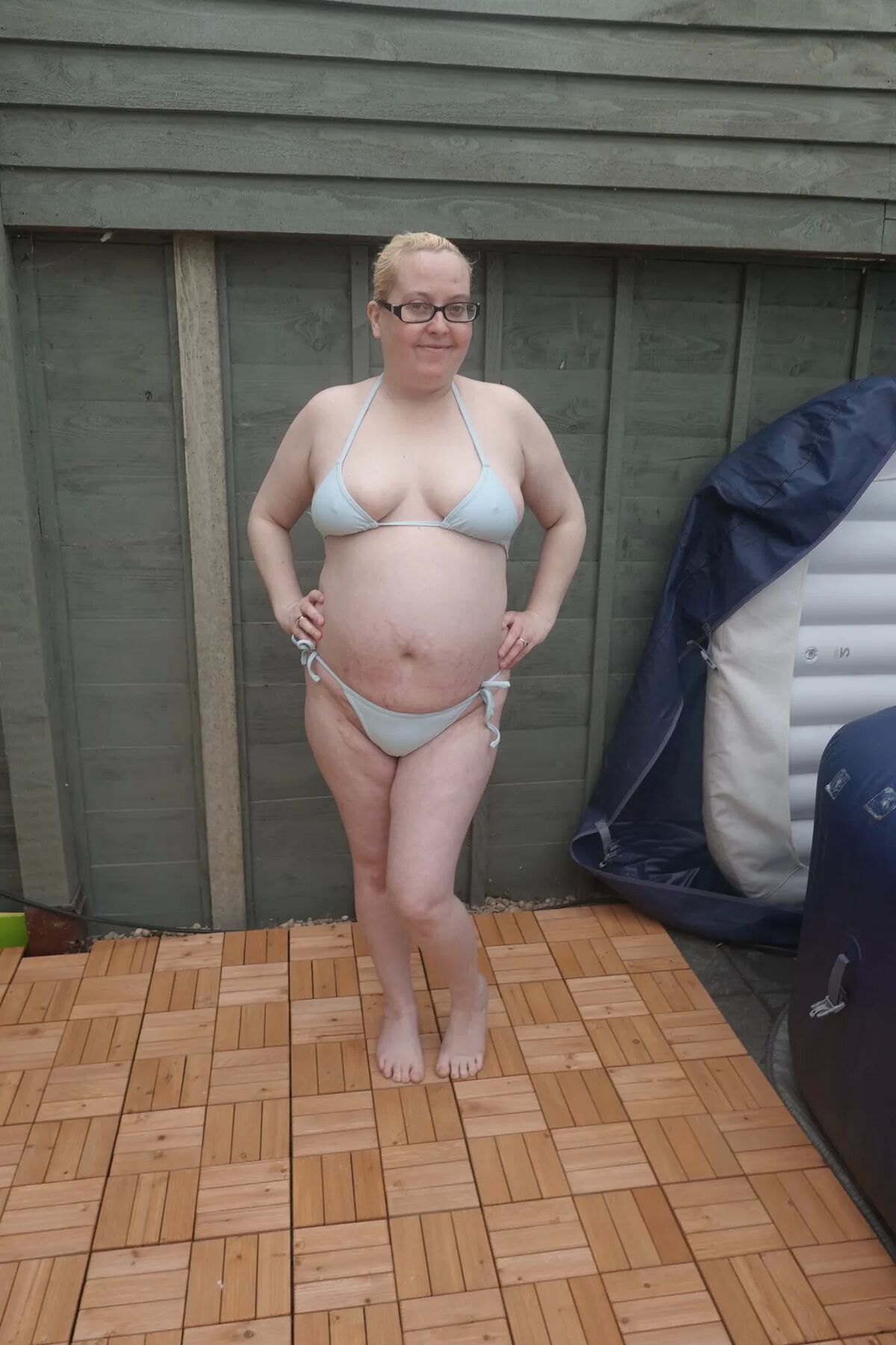 Big breasts wife in bikini