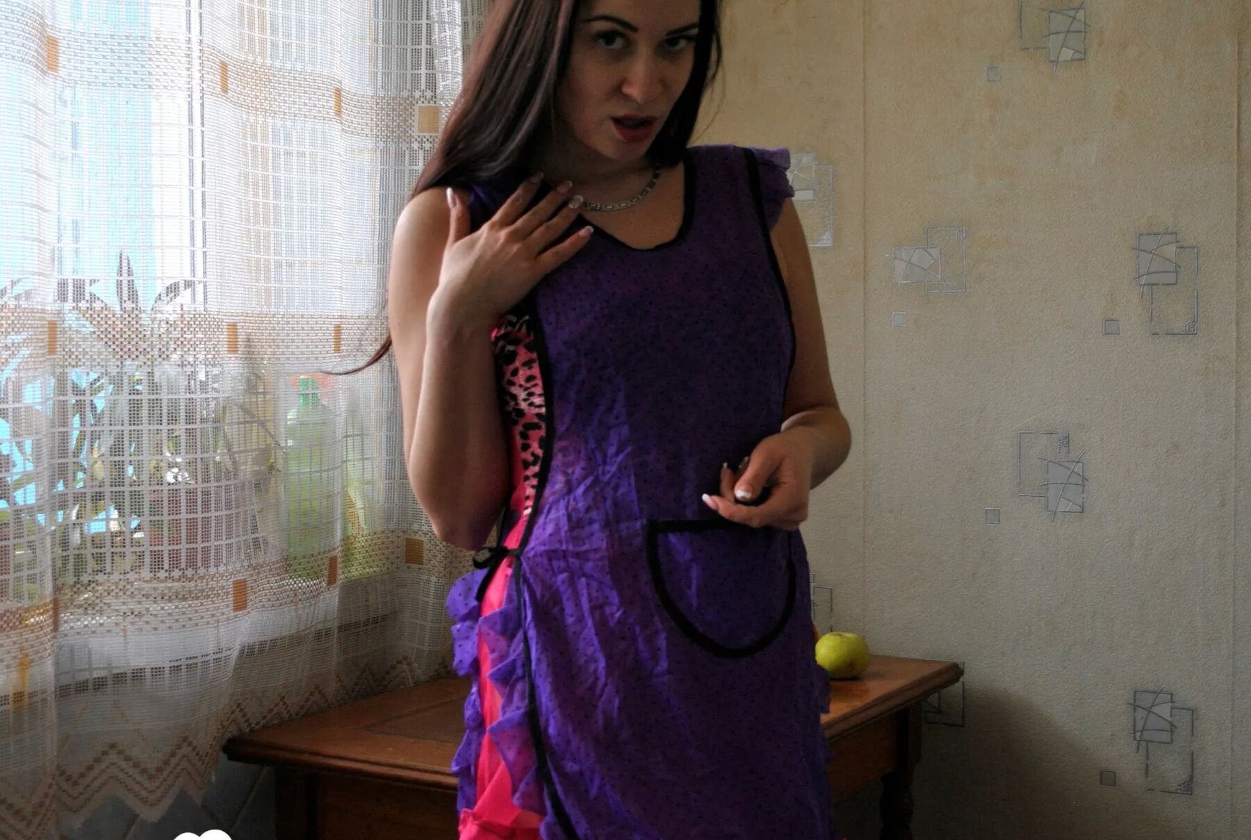 Brunette in stockings shoving a banana into herself
