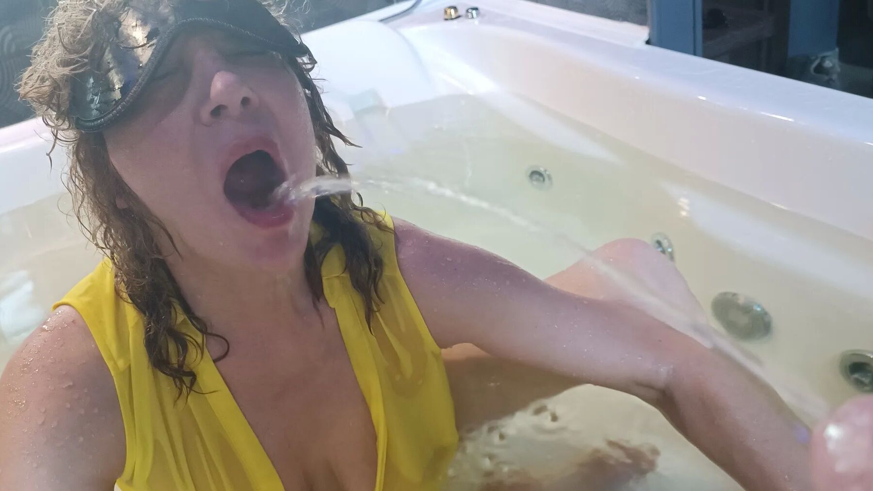Pissed on milf in jacuzzi