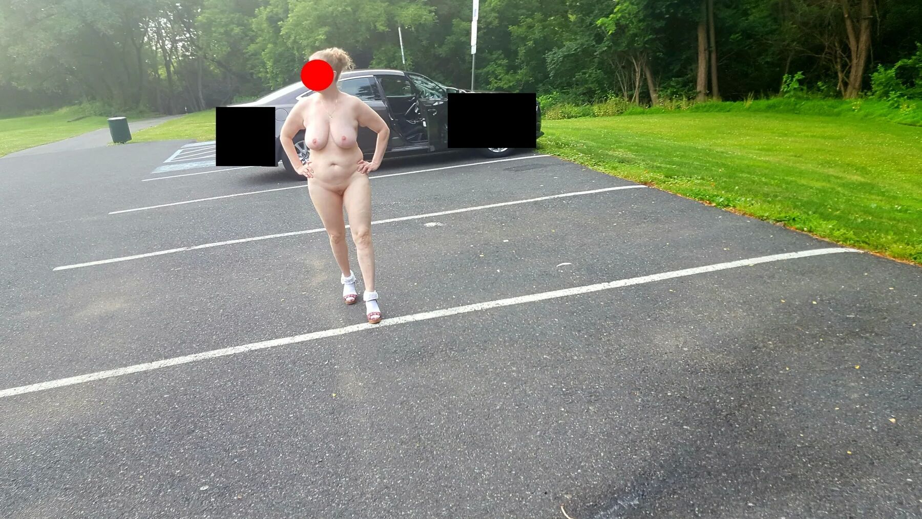 Naked parking lot walk