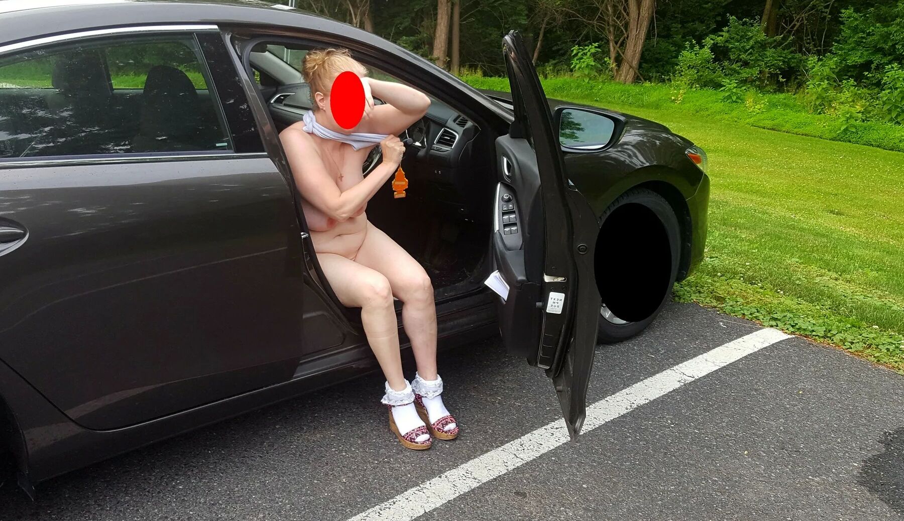 Naked parking lot walk