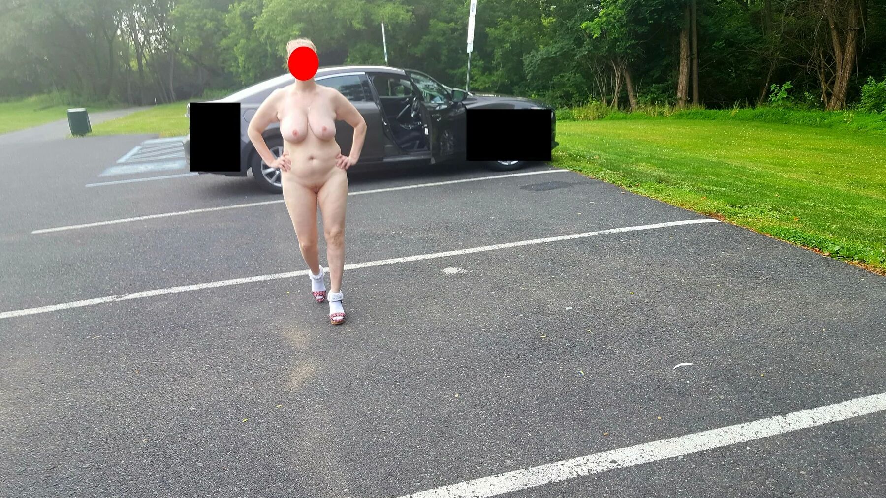 Naked parking lot walk
