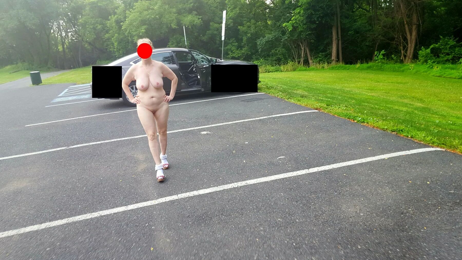 Naked parking lot walk