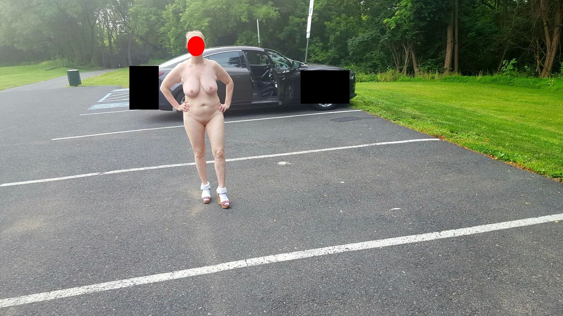 Naked parking lot walk