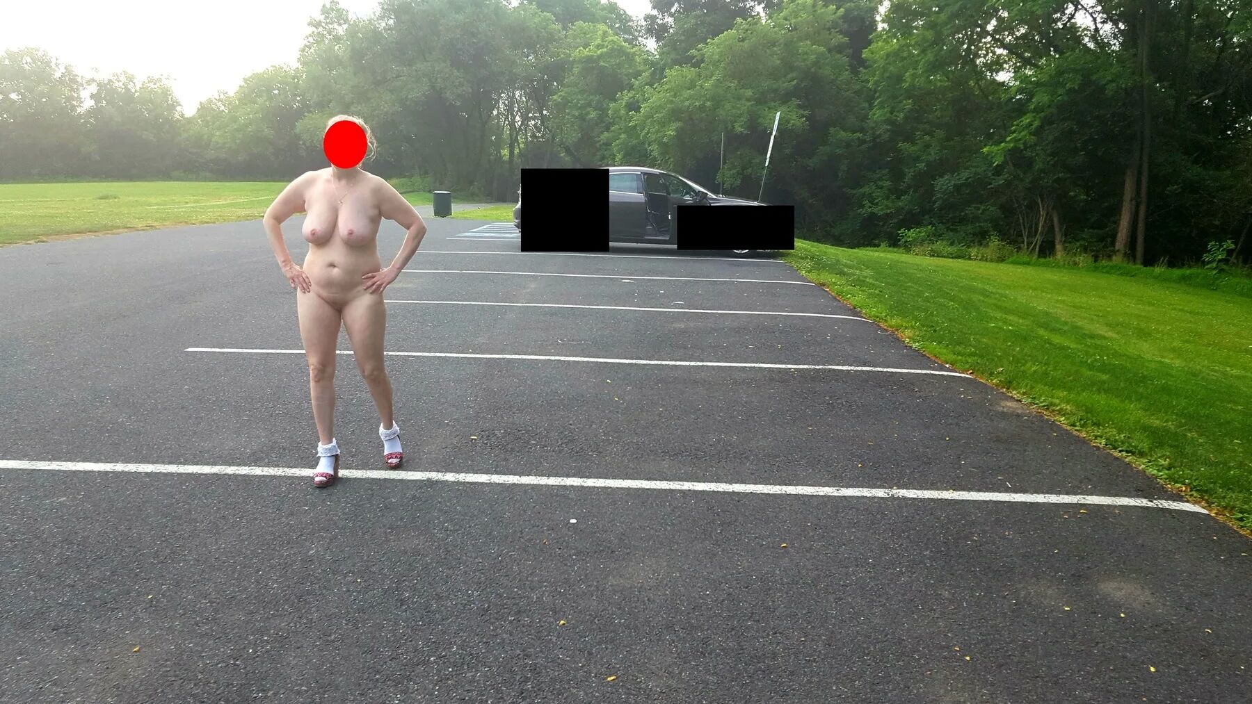 Naked parking lot walk