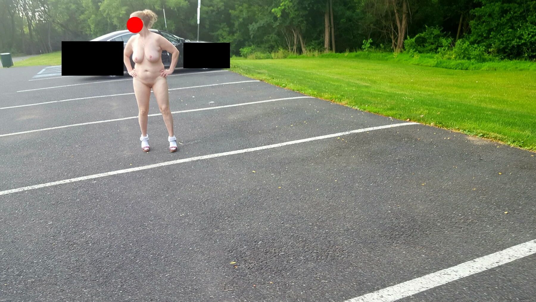 Naked parking lot walk