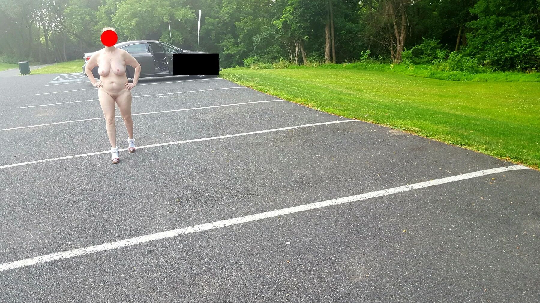 Naked parking lot walk
