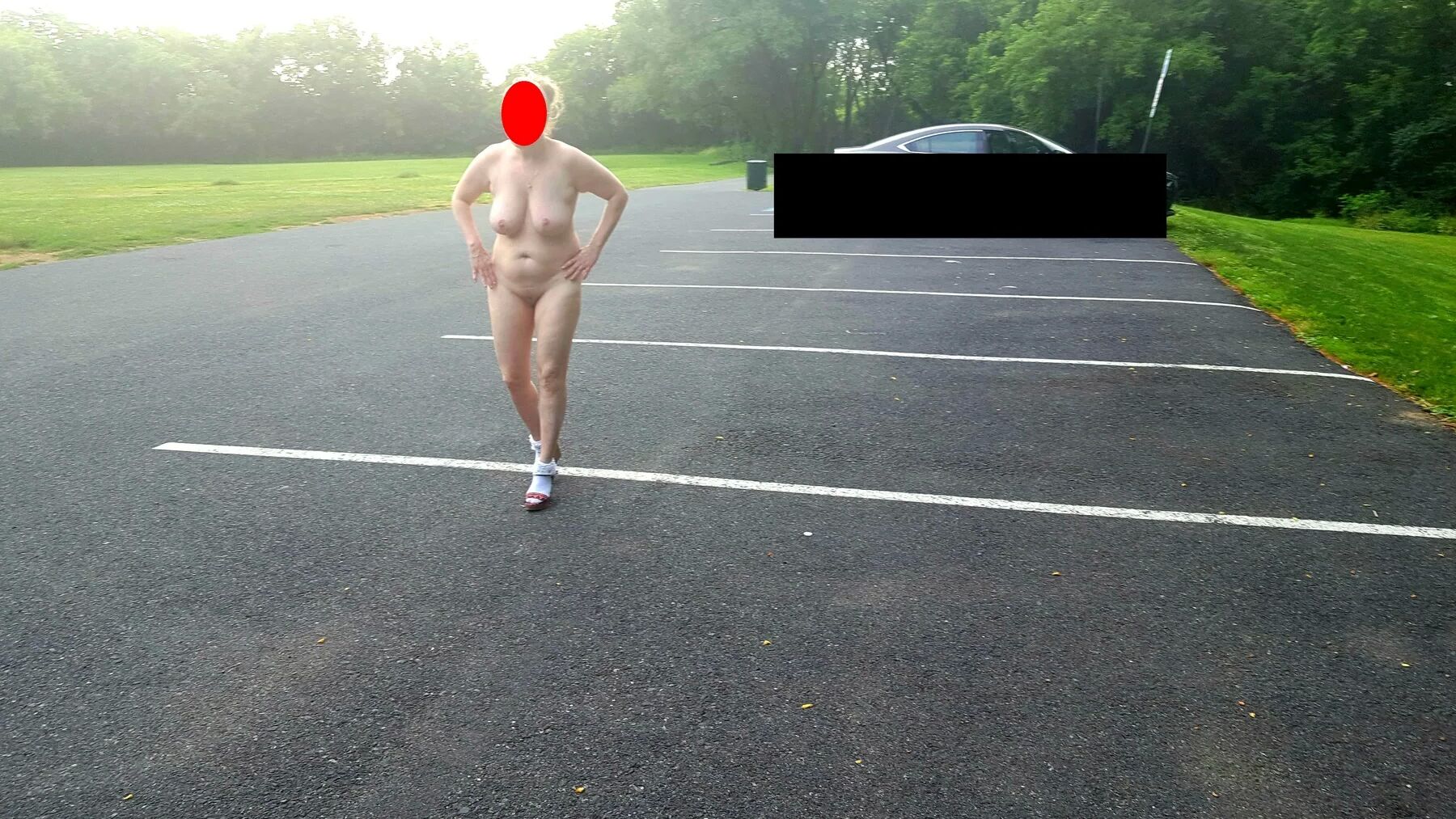 Naked parking lot walk