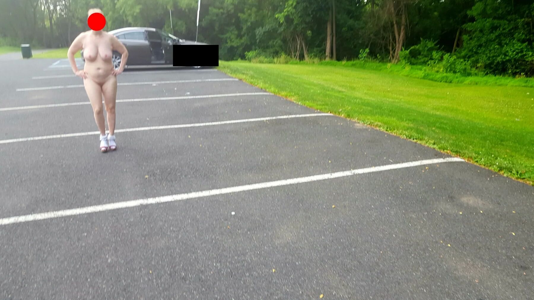 Naked parking lot walk