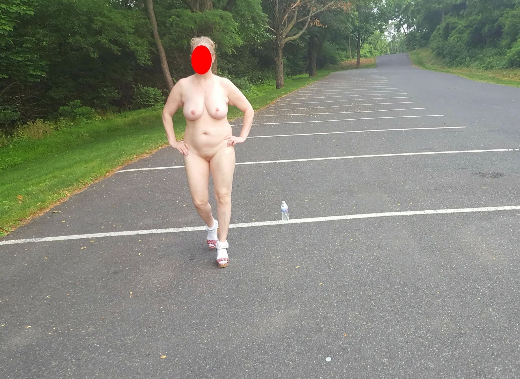 Naked parking lot walk