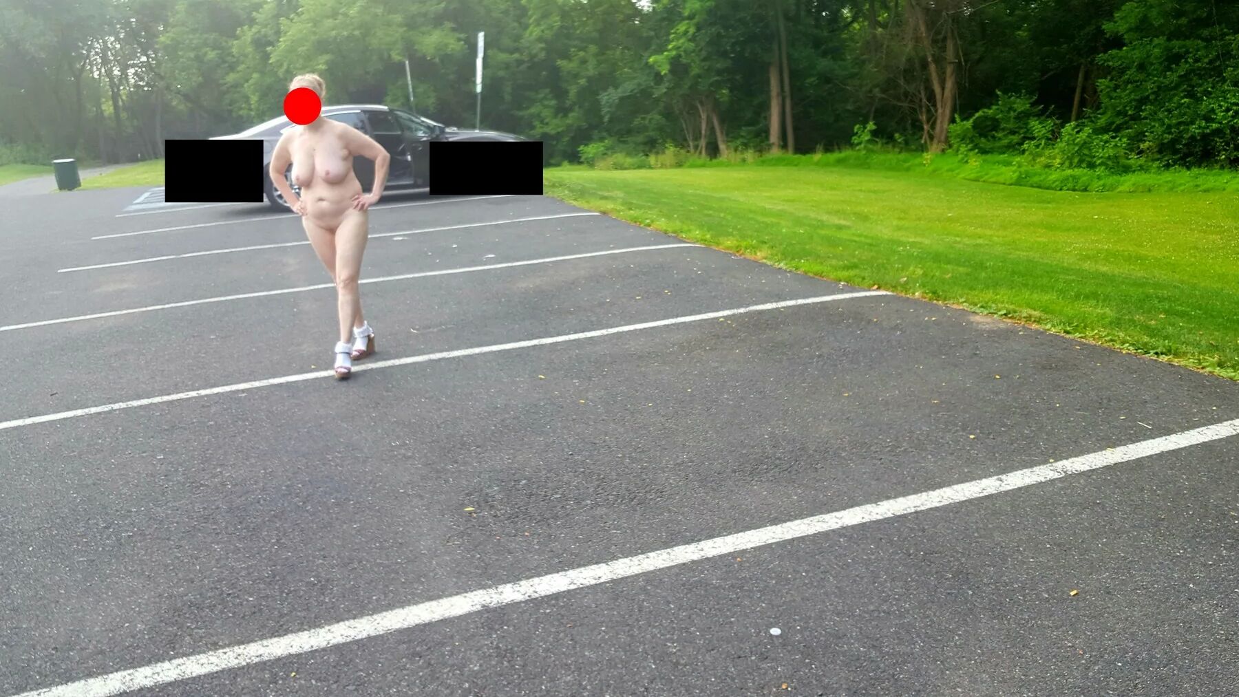 Naked parking lot walk