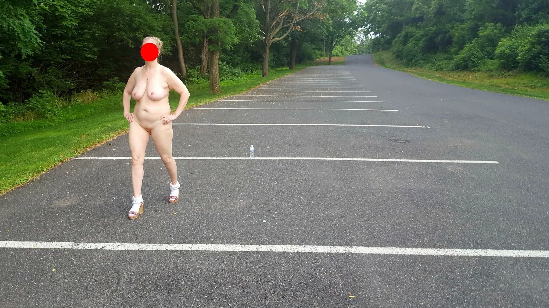 Naked parking lot walk