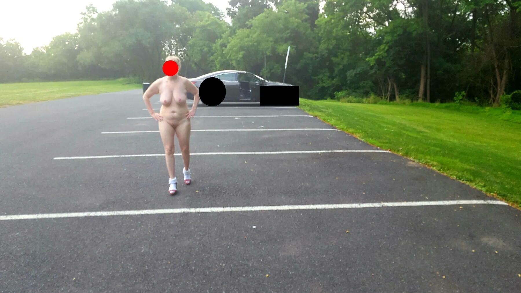 Naked parking lot walk