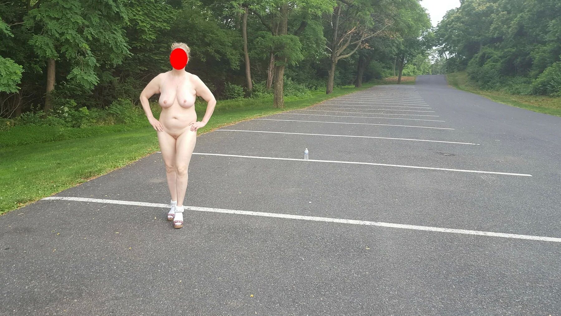 Naked parking lot walk