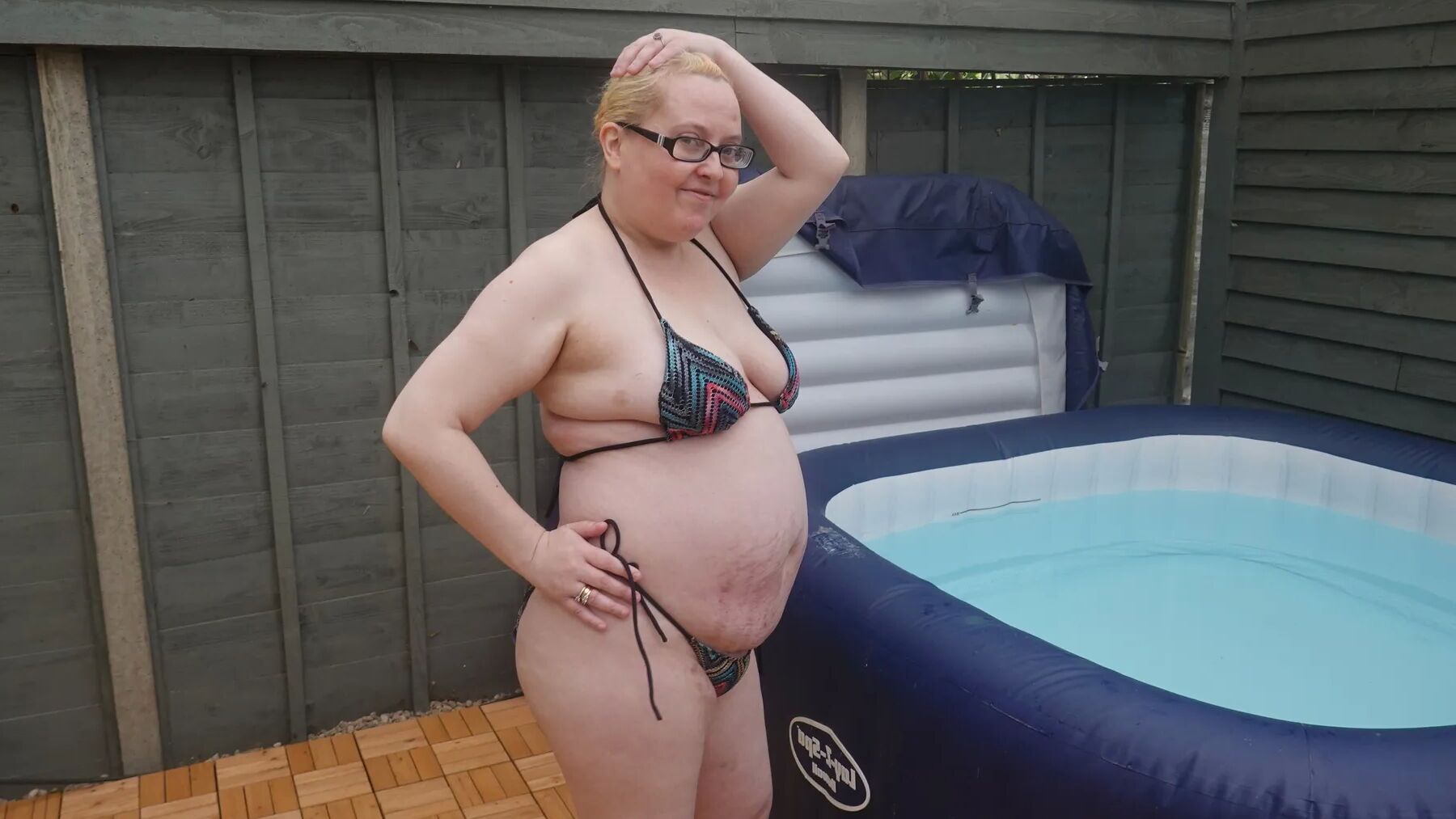 Sexy string bikini in the hot tub