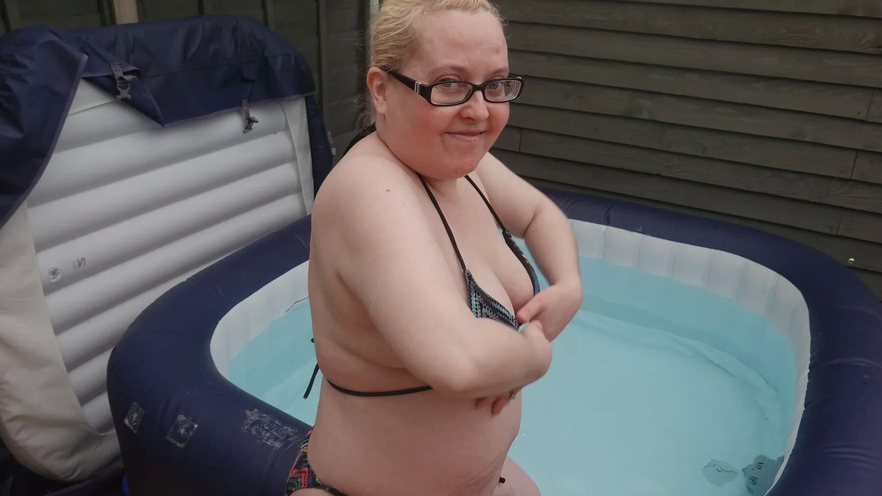 Sexy string bikini in the hot tub
