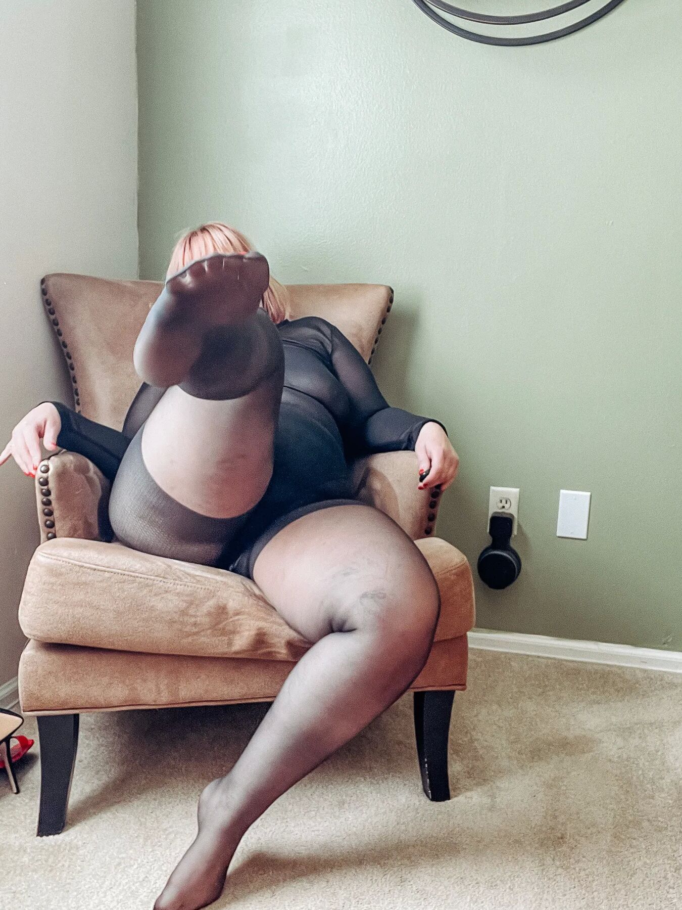 Gorgeous BBW in a black body suit see through Lace Sheer