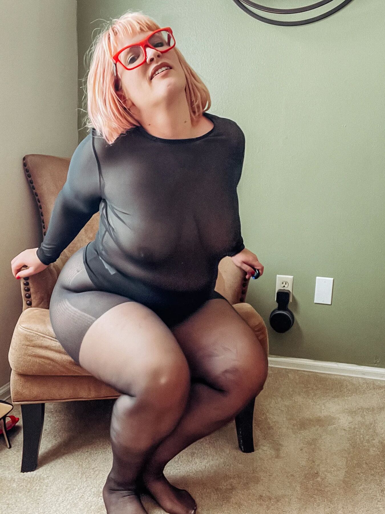 Gorgeous BBW in a black body suit see through Lace Sheer
