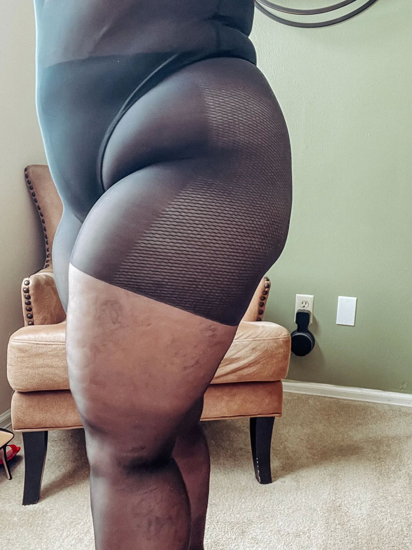 Gorgeous BBW in a black body suit see through Lace Sheer