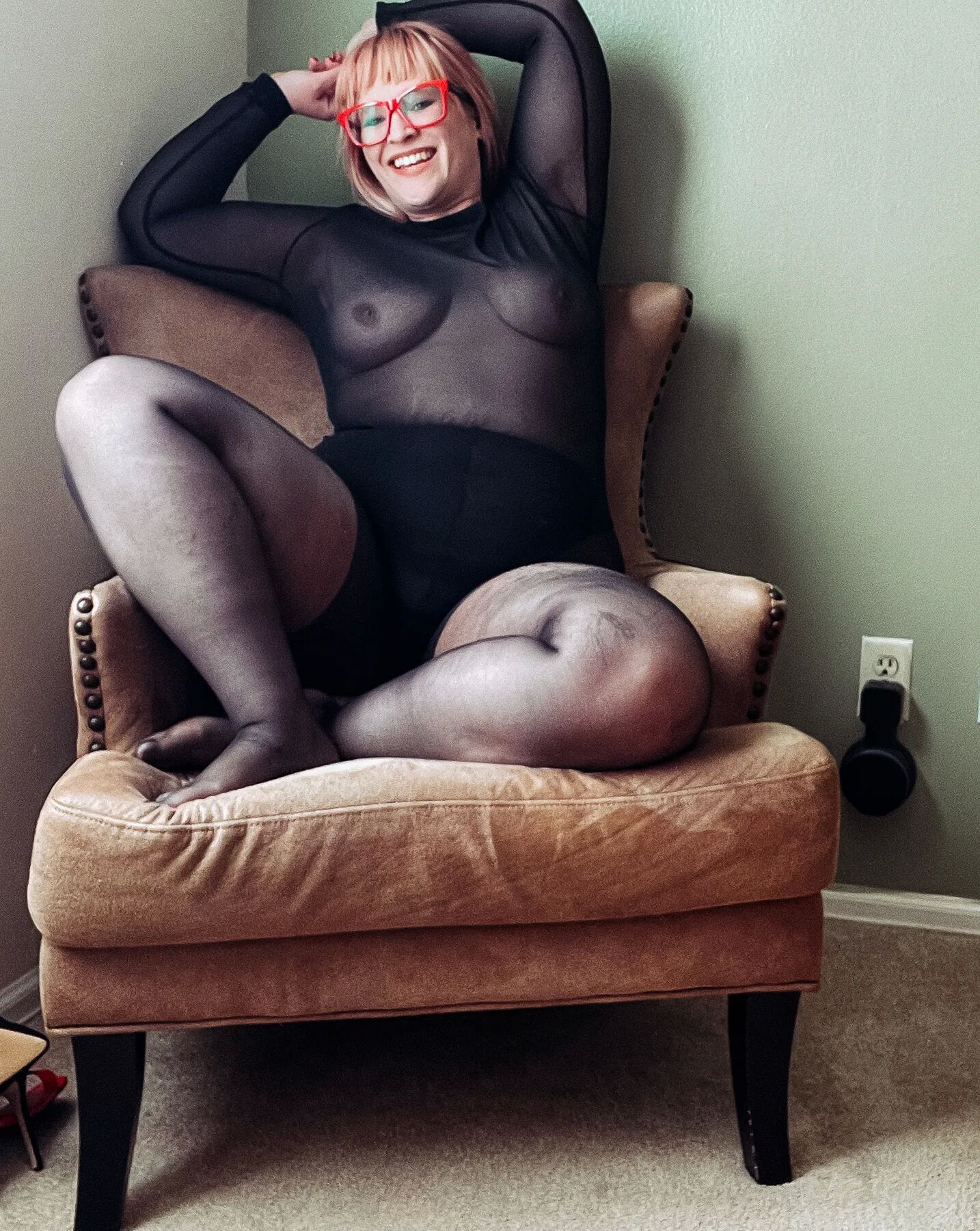 Gorgeous BBW in a black body suit see through Lace Sheer
