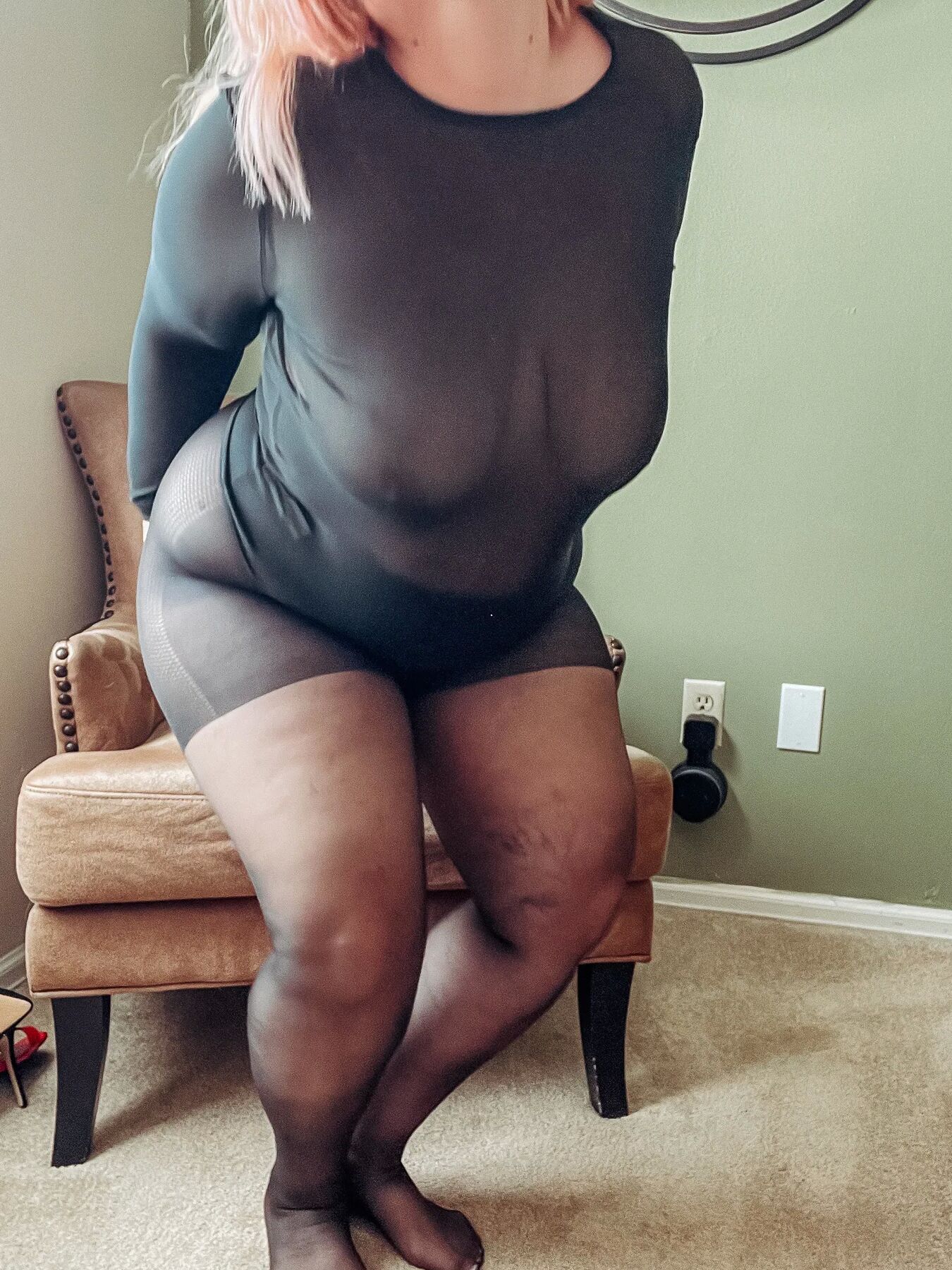 Gorgeous BBW in a black body suit see through Lace Sheer