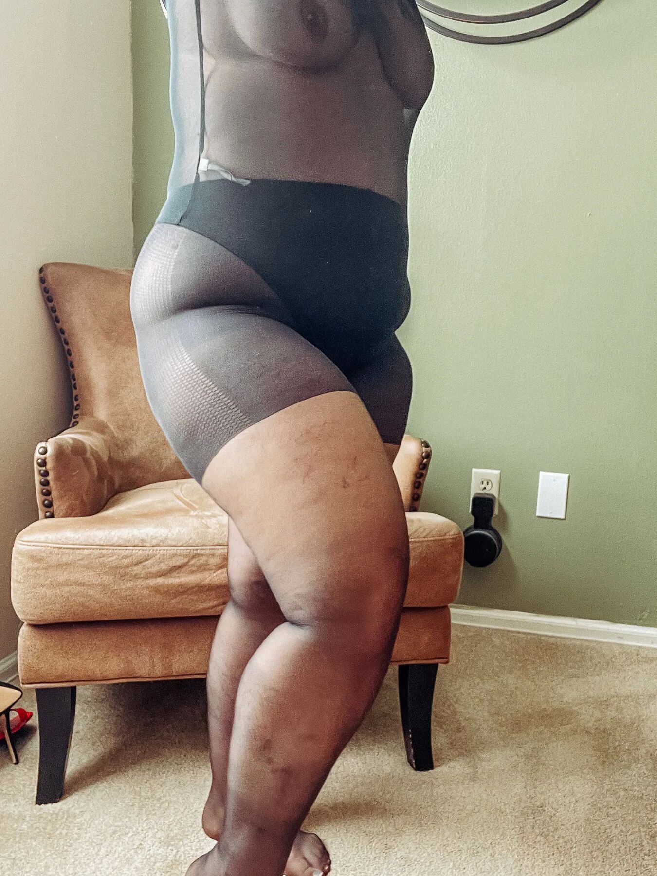 Gorgeous BBW in a black body suit see through Lace Sheer
