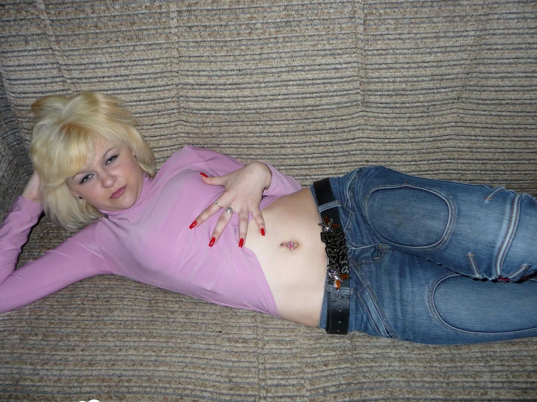 Horny blonde student taking some naughty pics
