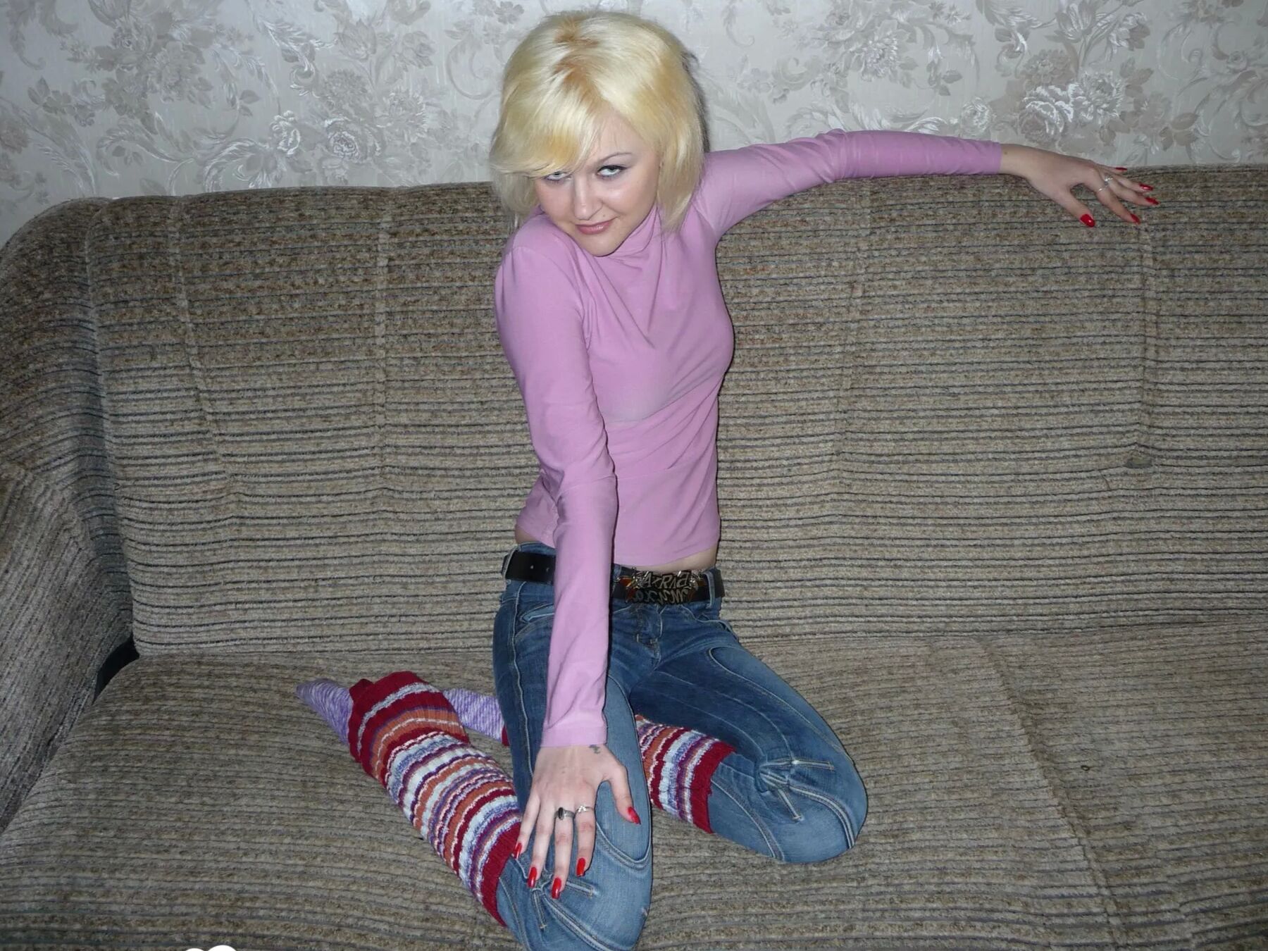 Horny blonde student taking some naughty pics