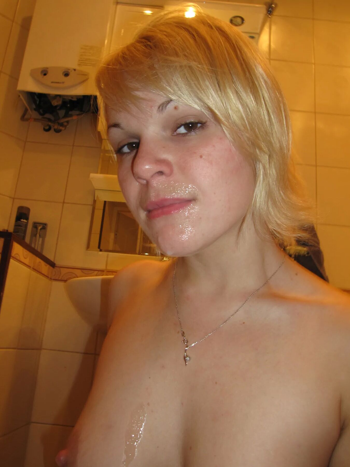 Sperm on young blonde's body