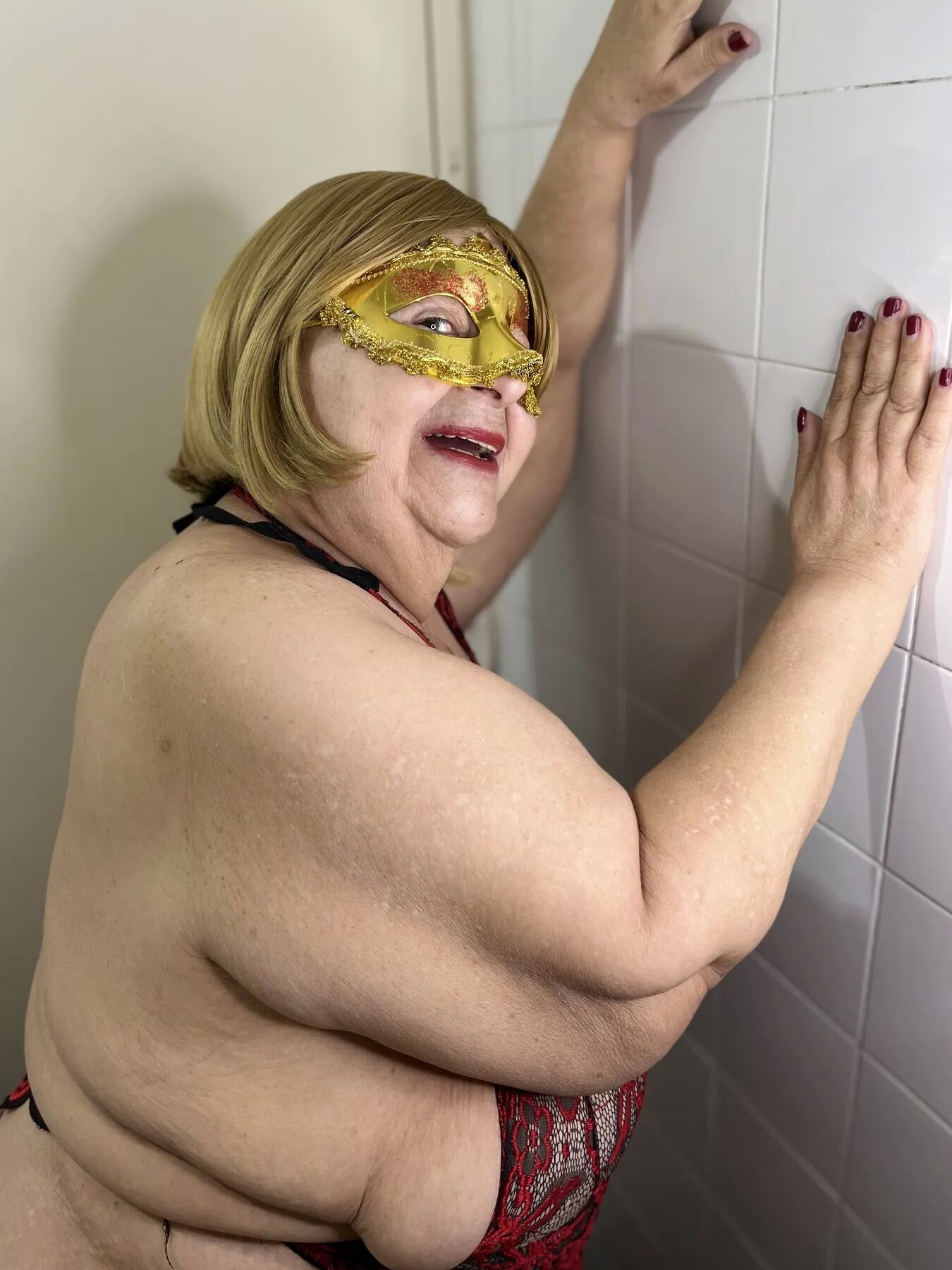 Sexy and very fat granny wearing red lingerie