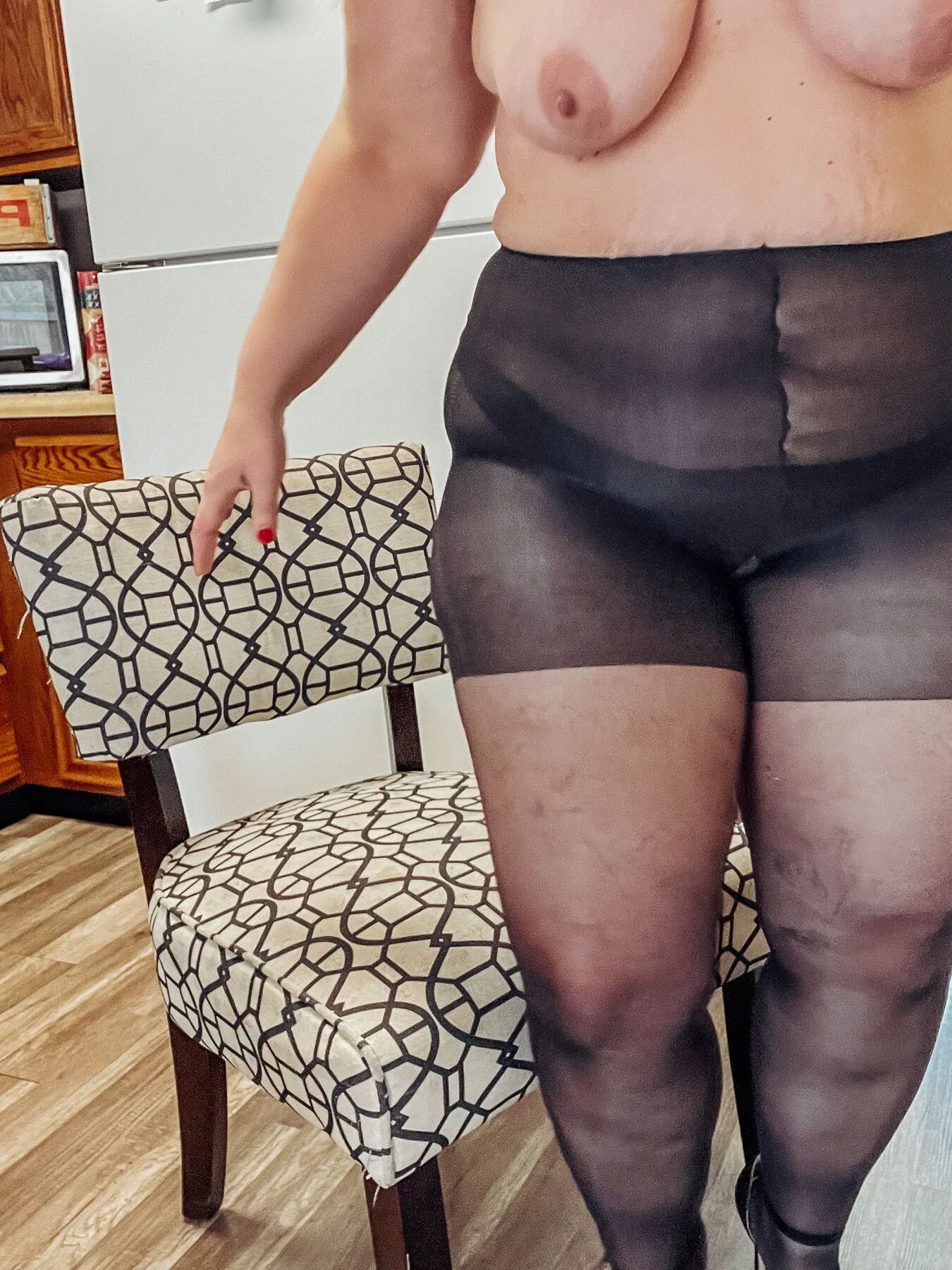 StepMom bent over in the kitchen in her tight nylons black