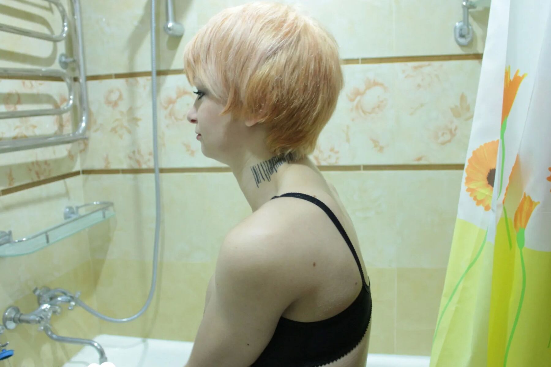 Taking some pictures of my redhead wife showering