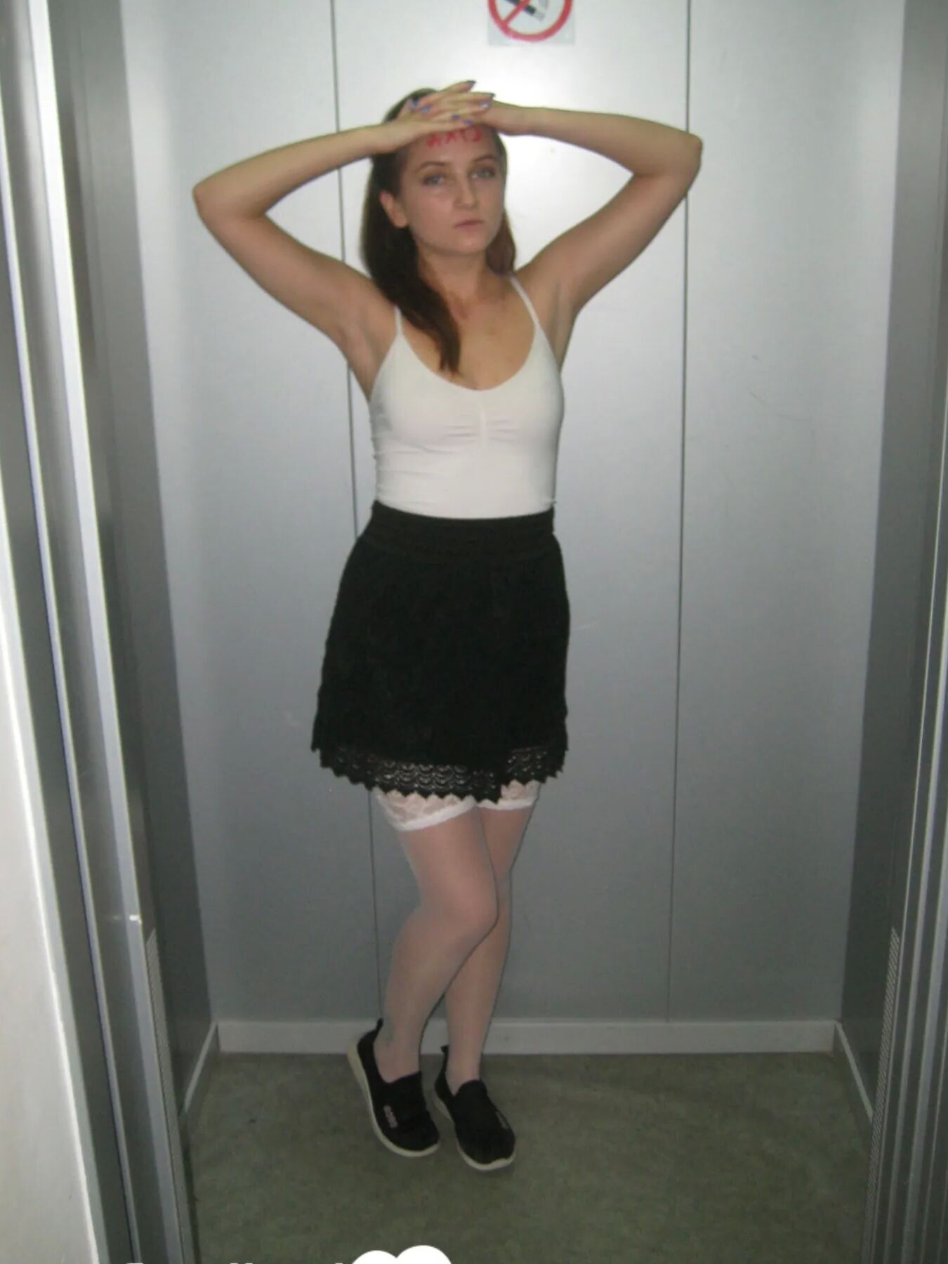 Extraordinary brunette in stockings displaying her pretty feet
