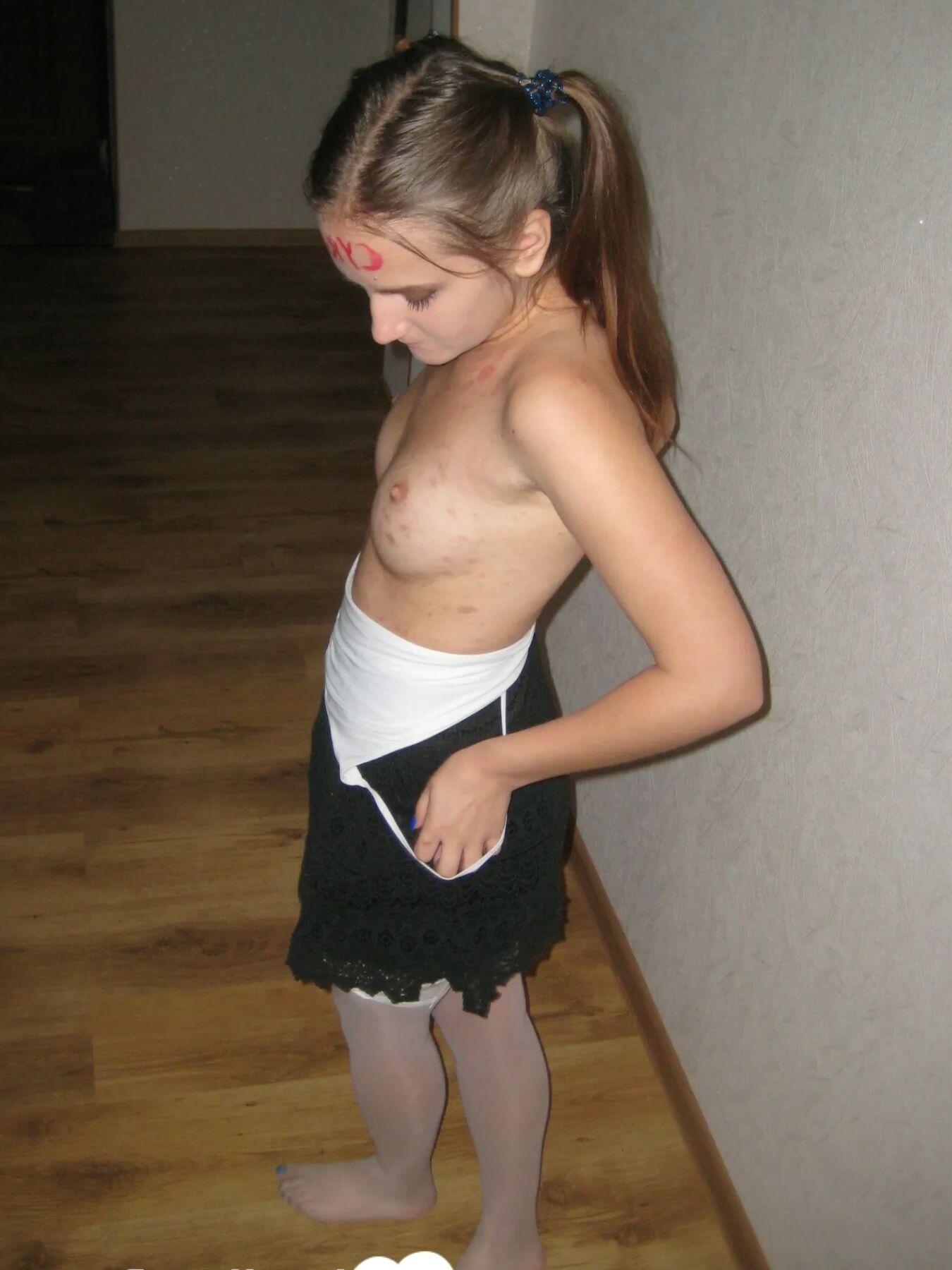 Extraordinary brunette in stockings displaying her pretty feet