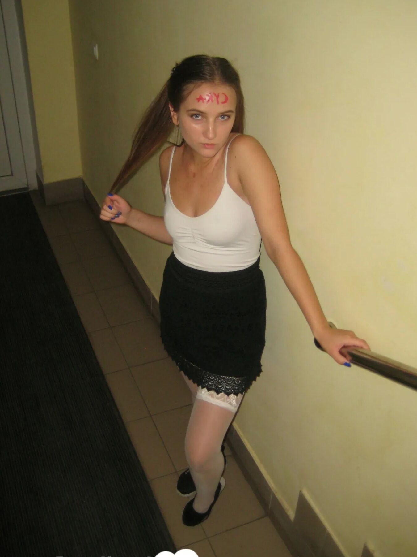 Extraordinary brunette in stockings displaying her pretty feet