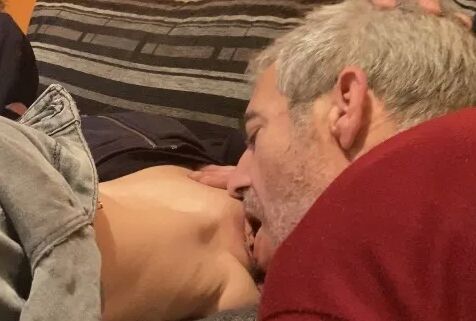 EATING BREAKFAST PUSSY IN PAJAMAS ON THE SOFA AT HOME