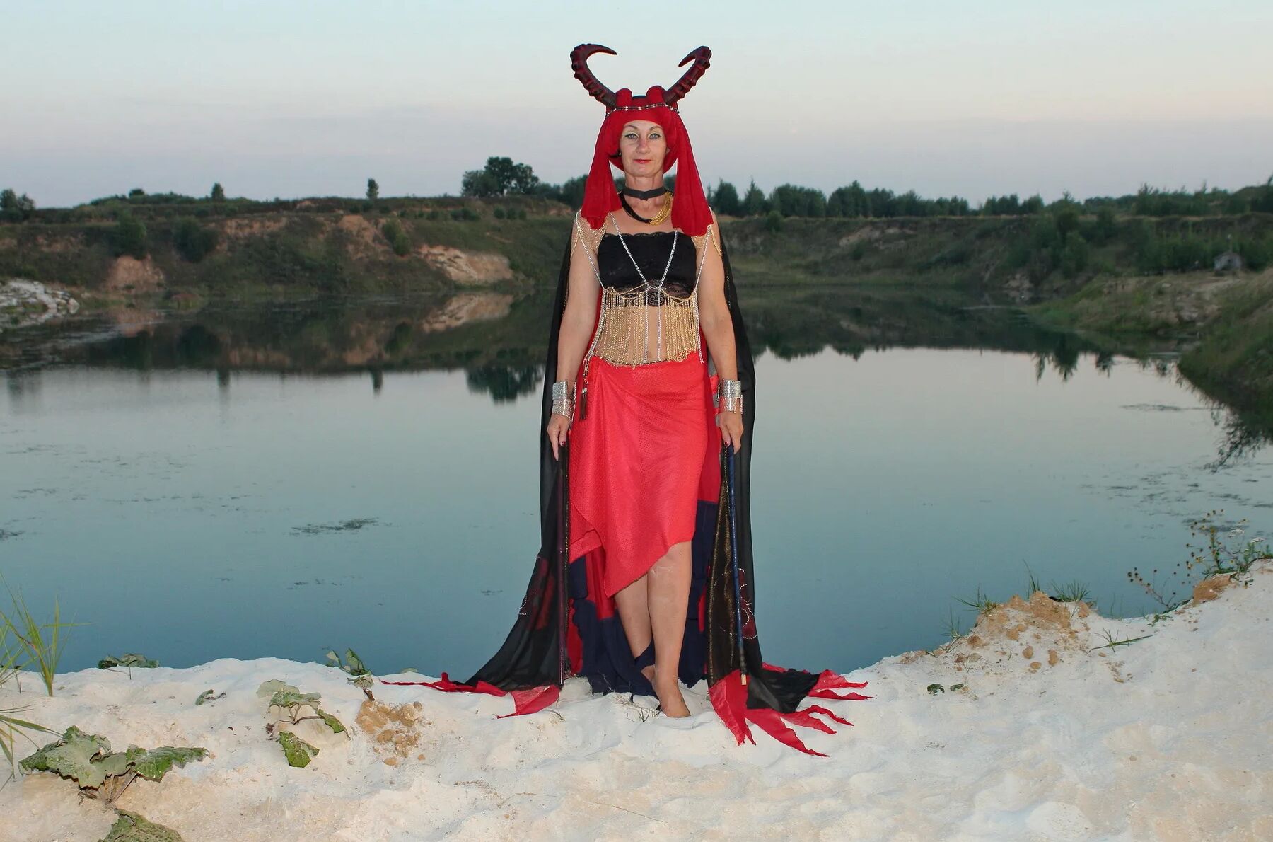 Witch over lake on sunset