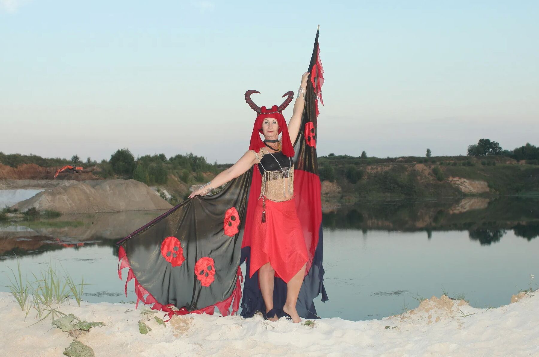 Witch over lake on sunset
