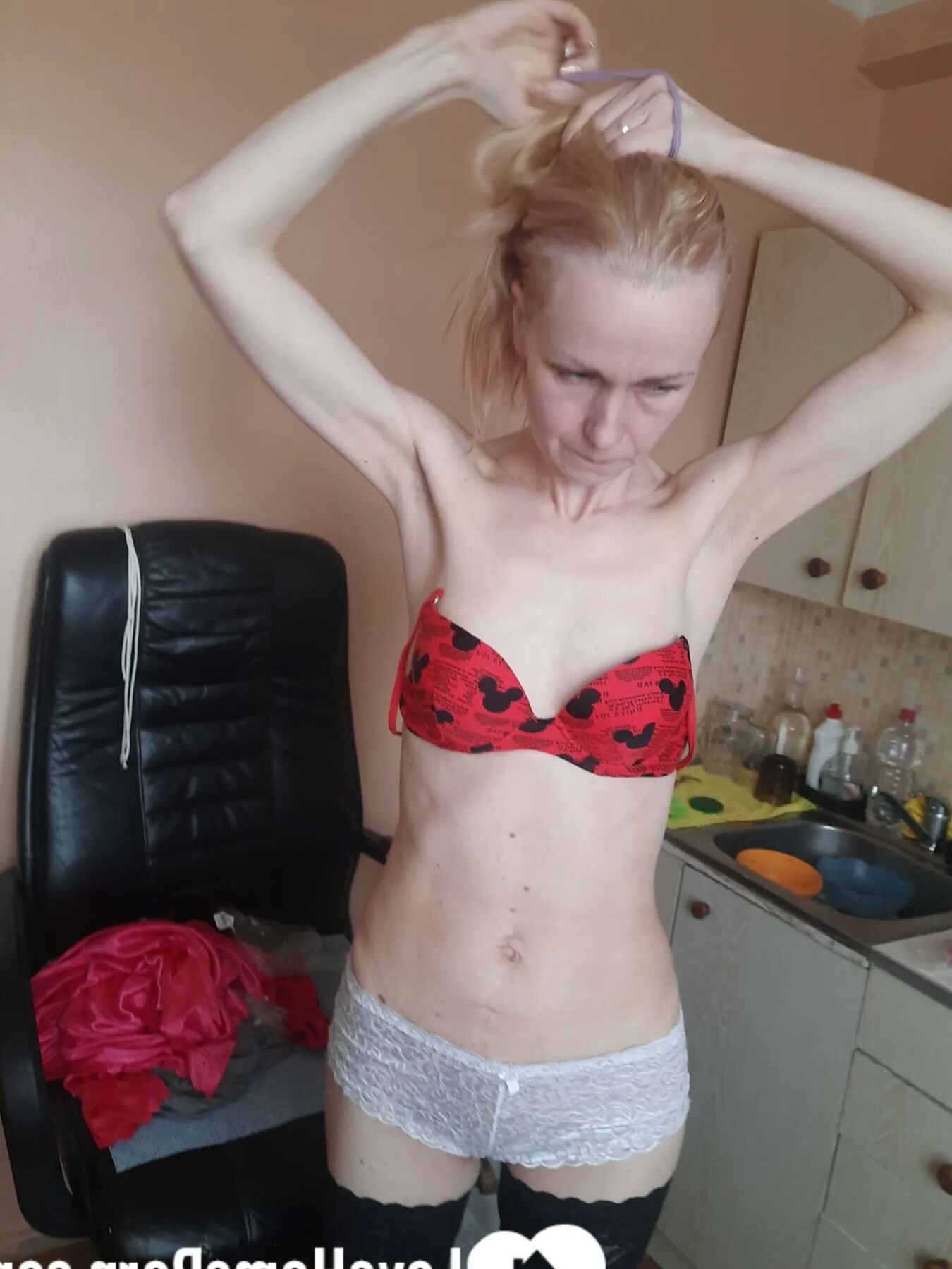 MILF in stockings fools around for a bit
