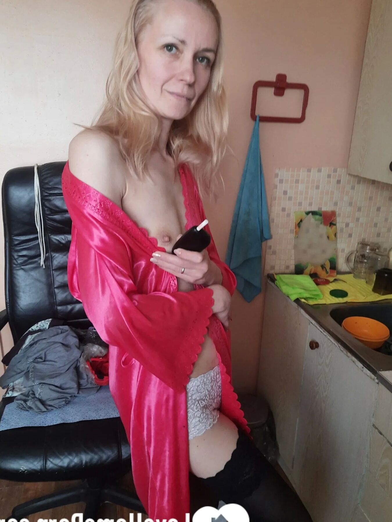 MILF in stockings fools around for a bit