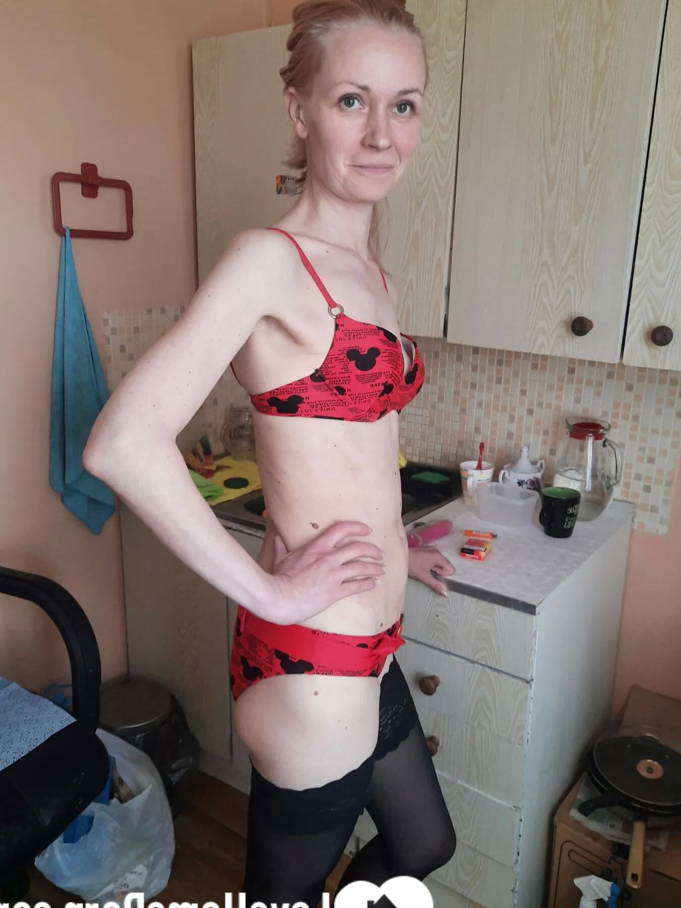 MILF in stockings fools around for a bit