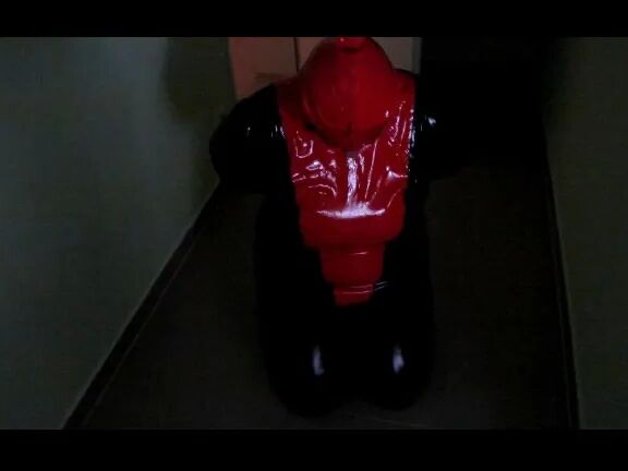 Petplay in latex suit ...