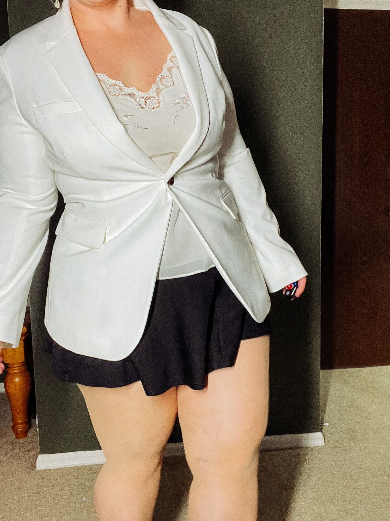 BBW in a mini black skirt and nylons with heels Big Thighs